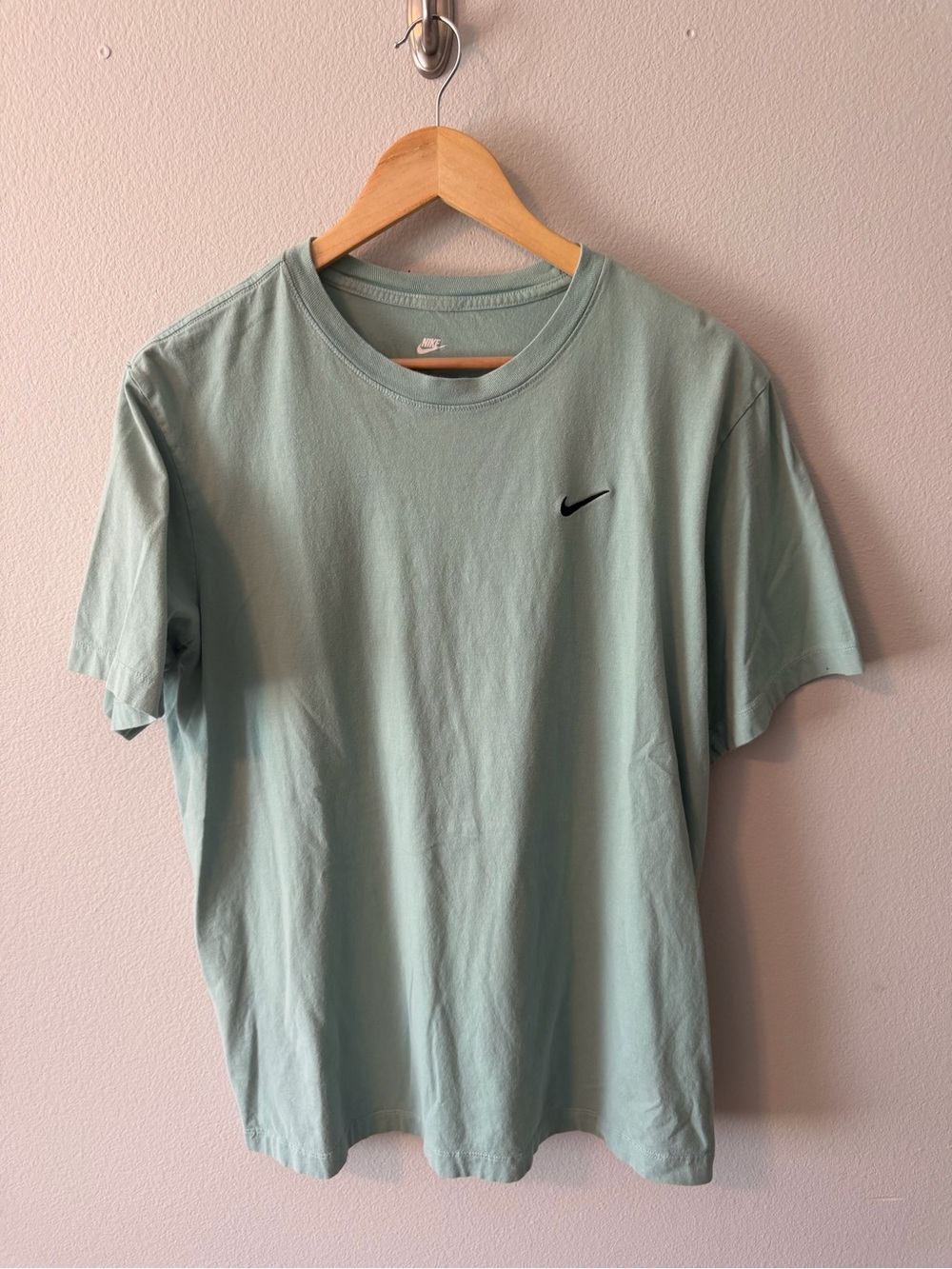 Nike Menโs Mint Green Short Sleeve Tee with Black Swoosh